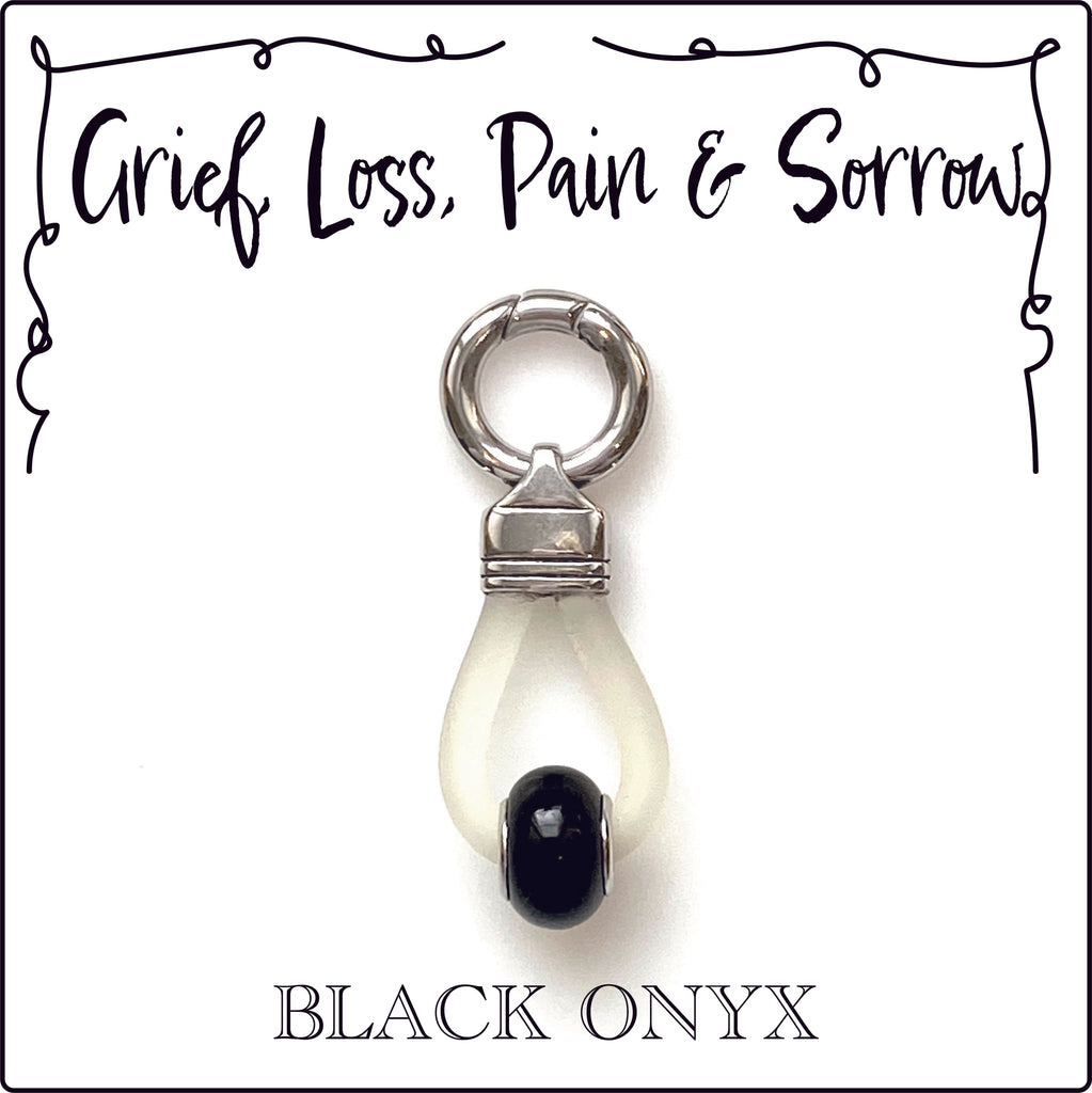 GREIF, LOSS, PAIN & SORROW - Energized Gemstone Collar Dangler - BLACK ONYX is the perfect gemstone to clear away bad Karma and heal from pain and sorrow. This is most important gemstone for anyone or any pet that has a lost love or a companion. In Arabic, the word Onyx means "sadness", which perfectly describes the energy that Onyx an offer, absorbing pain and sorrow. This a a great gemstone for Rescue Dogs to help them move on, to heal and accept the past and help them to accept new love.
